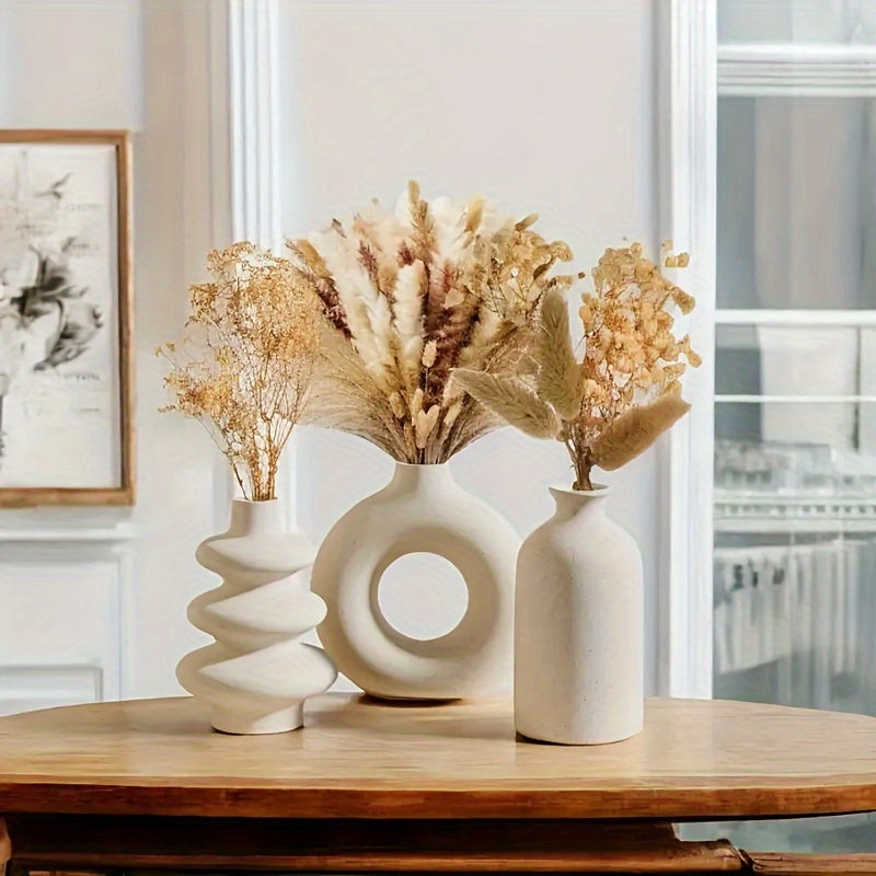 Conjunto de 3 vasos de cerâmica em estilo boémio com designs brancos redondos e torcidos, adornados com arranjos florais naturais. Ideal para decoração de casa, casamentos, salas de estar, quartos e exposições de cafés.