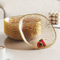 Conjunto de 4 Pratos Elegantes Transparentes para Snacks e Fruta com Borda Dourada, Fabricados com Materiais de Alta Qualidade para Alimentos, Formato Oval, Perfeitos para Refeições Familiares, Convívios e Todas as Estações, Adequados para Fruta, Snacks e Pratos de Servir.